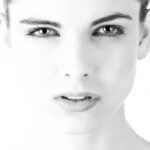 Black and white close up of woman's face