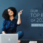 Our top blogs is 2022! A woman on a computer is pointing to the title