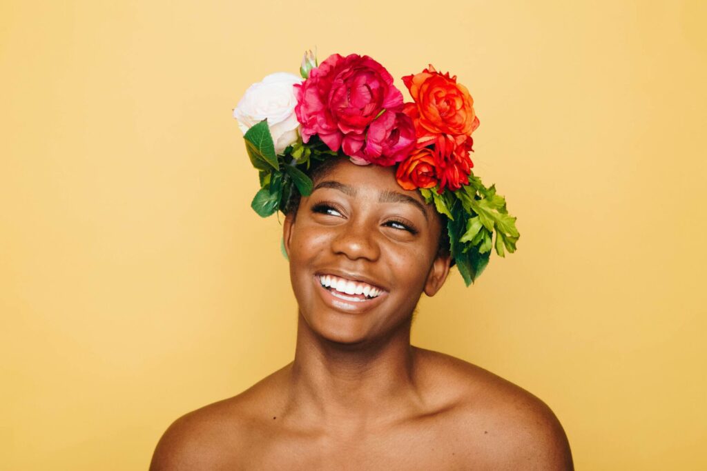 Woman smiling and wearing a flower crown