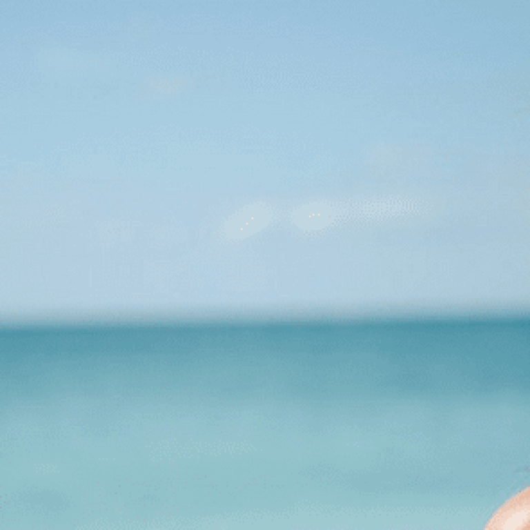 woman at the beach admiring the view