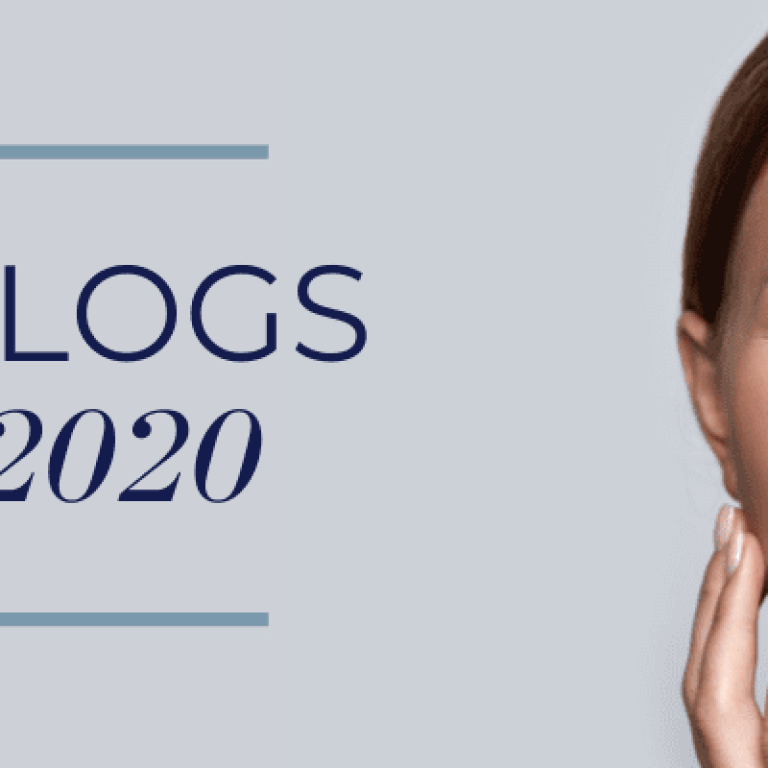 Top blogs from 2020 with woman touching her face