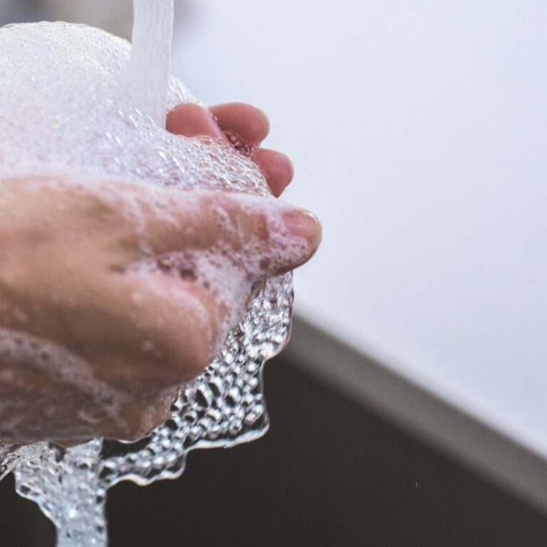 Washing hands in the sink